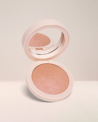 EM Cosmetics Heaven's Glow Blush in Baroque, a peachy coral with gold reflects for a healthy, radiant cheek glow.