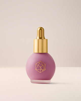 EM Cosmetics Color Drops Serum Blush in Little Lilac, a cool-toned lavender for a unique, ethereal, dewy cheek flush.