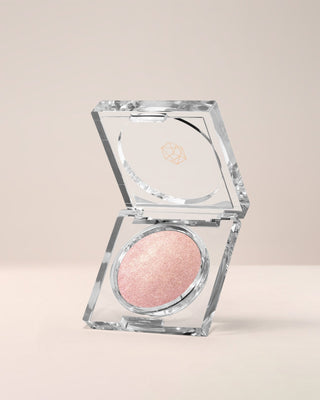 EM Cosmetics Cosmic Pearl Dewy Eyeshadow in Moonrise, a metallic rose gold for a luminous, pearlescent finish.