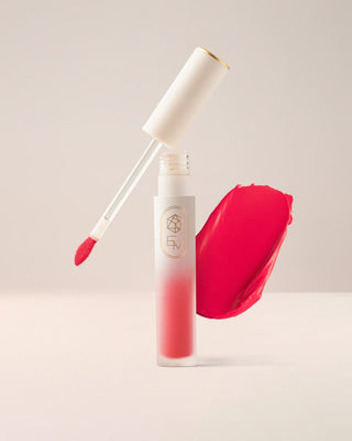 EM Cosmetics Soft Spoken Velvet Lip Creme in Flutter, a peachy nude shade for a soft, everyday velvet-matte lip.