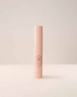 EM Cosmetics Three Wishes Glitter Wands with caps on, showing the sleek white packaging.