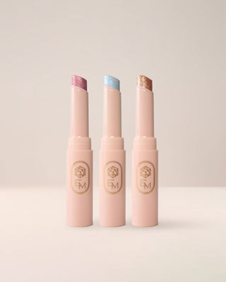 Collection of EM Cosmetics Three Wishes Glitter Wands, showing sparkling liquid glitters in three shades.