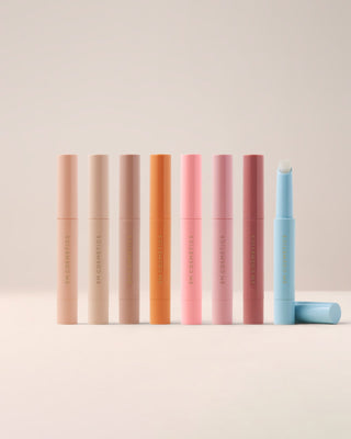A bundle of all EM Cosmetics Lip Cushion shades, a complete set of nourishing tinted lip luminizers for every mood.