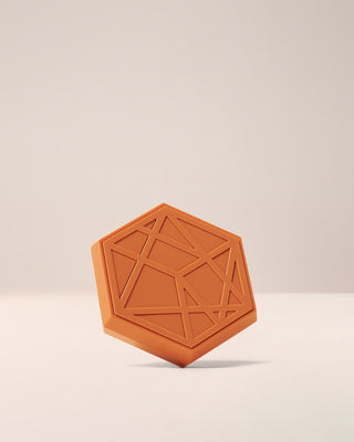 Closed compact of EM Cosmetics Divine Skies Eyeshadow Palette in Faded Clementine, showing the classic logo.