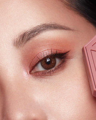 Michelle Phan wearing EM Cosmetics Divine Skies in Venetian Rose for a soft, romantic pink eye look.