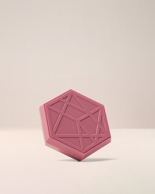 Closed compact of EM Cosmetics Divine Skies Eyeshadow Palette in Venetian Rose, showing the classic logo design.