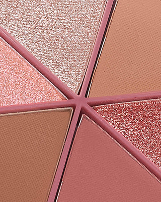 Arm swatches of EM Cosmetics Divine Skies Palette in Venetian Rose, showing matte and shimmer textures.