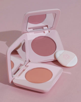 Closeup of EM Cosmetics Pillow Plush Blush texture.