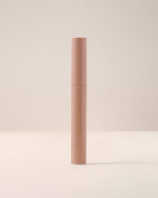 EM Cosmetics Lip Cushion Tinted Lip Luminizer in Van Gogh, shown in its sleek, color-coordinated packaging.