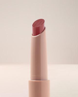 Close-up texture shot of EM Cosmetics Lip Cushion in Van Gogh, highlighting its nourishing, balmy formula.