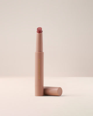 EM Cosmetics Lip Cushion Tinted Lip Luminizer in Van Gogh, a deep rose shade, shown open to reveal the product.