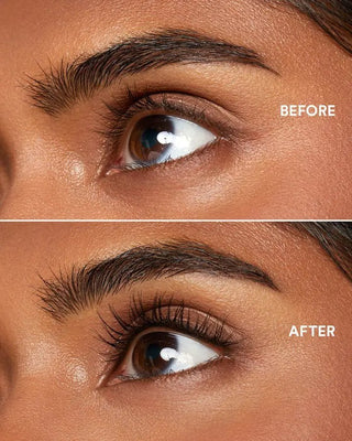 Model with dark skin demonstrating the impressive lengthening and volumizing effects of EM Cosmetics Shapeshift Tubing Mascara