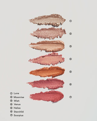 Texture swatch of EM Cosmetics Cosmic Pearl Eyeshadow in Moonrise, showing the rosy champagne radiance.
