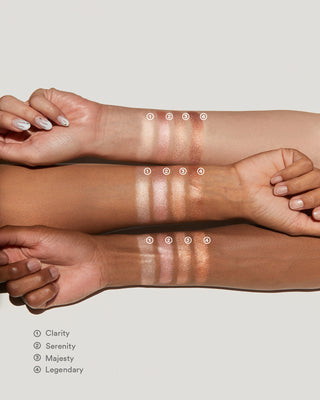 Arm swatches of EM Cosmetics Sunscape Highlighter in Legendary, showing the radiant golden glow.