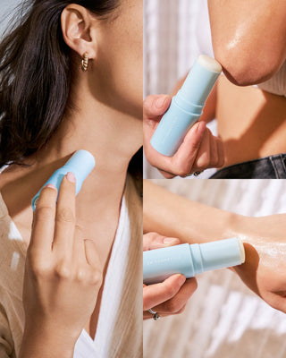 Model with medium skin applies EM Cosmetics Face Cuddle Moisture Balm to collarbones for a healthy-looking sheen.