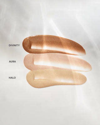 Arm swatches of EM Cosmetics Moonbeam Cushion Highlighters, including the champagne shade Divinity.