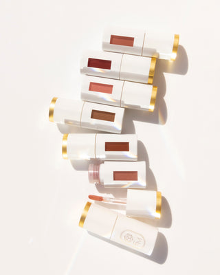 Close-up of the EM Cosmetics Everglass Lip Dew doe-foot applicator, designed for precise, glossy application.