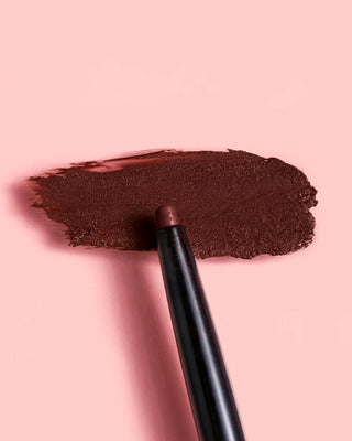 Texture swatch of EM Cosmetics Soft Blur Velvet Lip Liner in Foxy, showing the smooth, velvety formula.