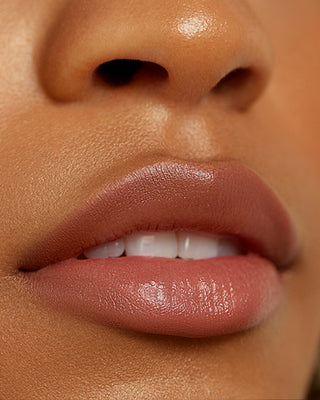 Model Mariah wearing EM Cosmetics Soft Blur Velvet Lip Liner in Kitten for a natural matte lip.
