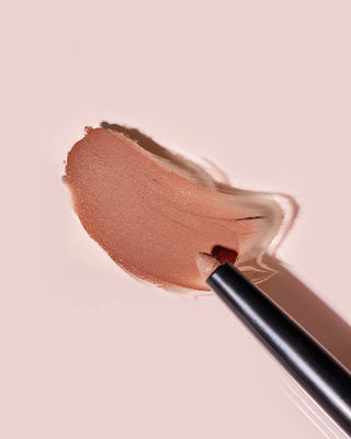 Arm swatch of EM Cosmetics Soft Blur Velvet Lip Liner in Kitten showing the velvet matte texture.