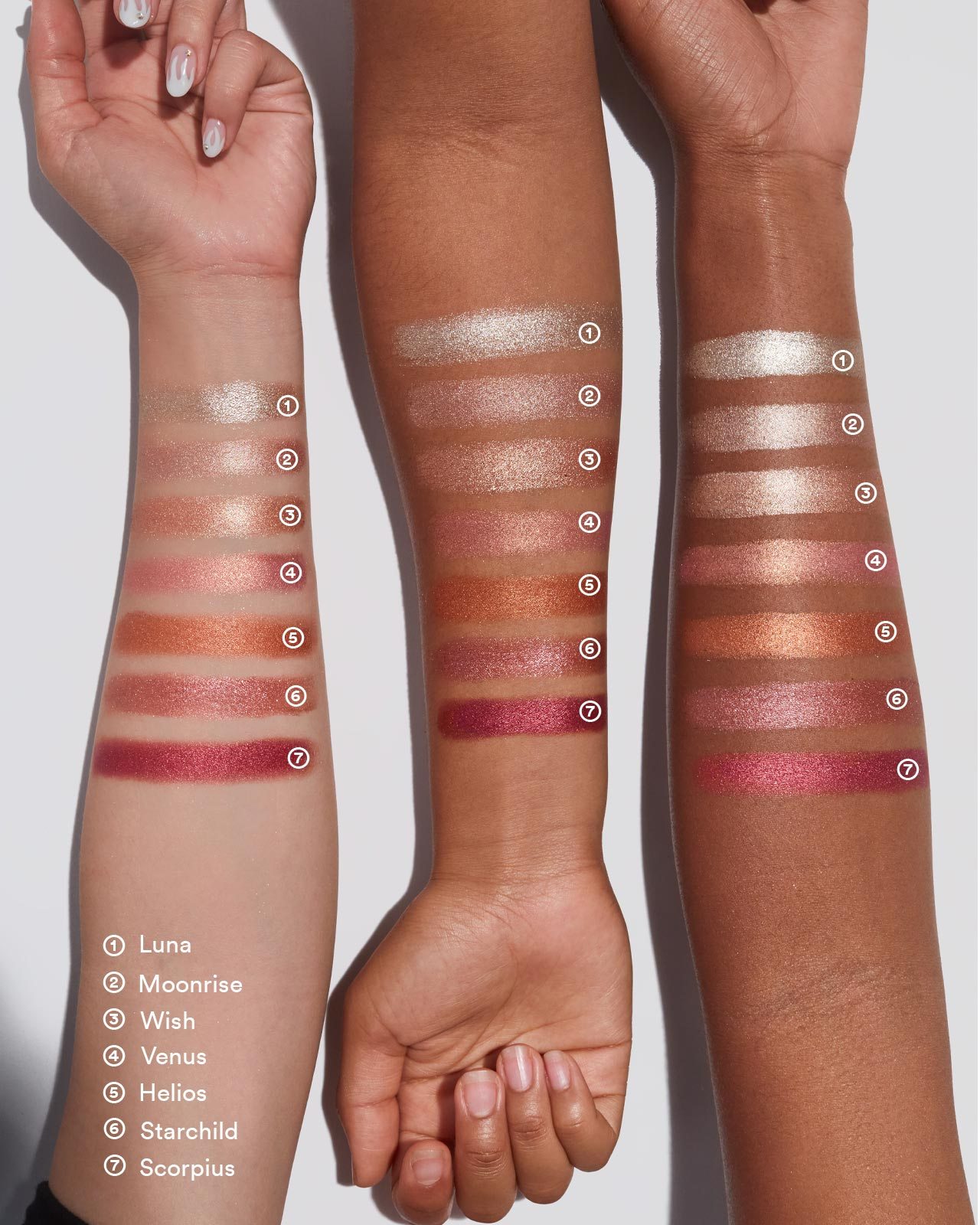 Shade swatches on three skin tones
